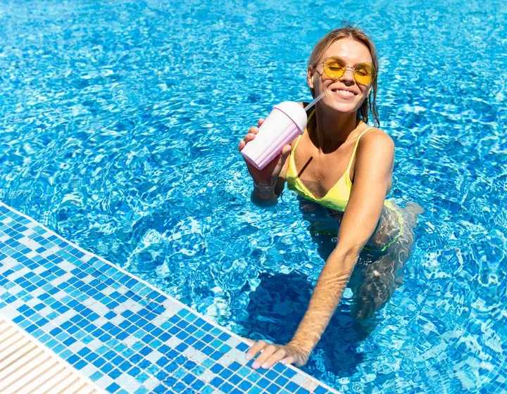 Relaxing by a clean pool